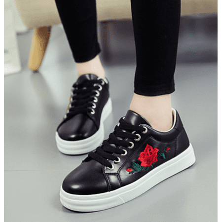 black trainers with flowers