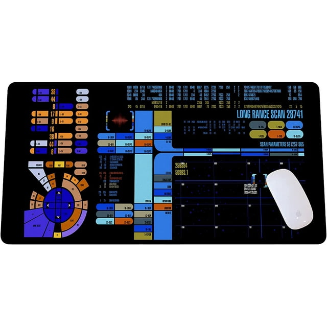 Trekkies Trekker Sci-fi Control Console Display Desk Mat, a large gaming mouse pad measuring 31.5 inches by 11.8 inches. The mat features a vibrant sci-fi control console design with colorful interface elements, including buttons, data panels, and futuristic graphics. Made with a soft material for noise reduction and smooth mouse gliding, it has a rubber base to prevent slipping. Suitable for gaming keyboards, laptops, and other desk items, it is flexible and easy to roll up for transport. Ideal for gaming setups or as a sci-fi-themed gift.