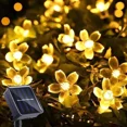thumbnail image 1 of Guirnalda de 50 luces LED solares para exterior, guirnalda de luces con diseño de flor de cerezo, 50 LED, 2 modos, impermeable, para jardín, patio, Navidad, decoración de interiores, blanco cálido [Cl, 1 of 5