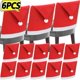 thumbnail image 2 of Cubierta trasera de silla de Navidad, cubierta de silla roja no tejida, sombrero de Papá Noel, asiento de Navidad, cena de Año Nuevo, fiesta, Festival, decoración del hogar, 2 of 5