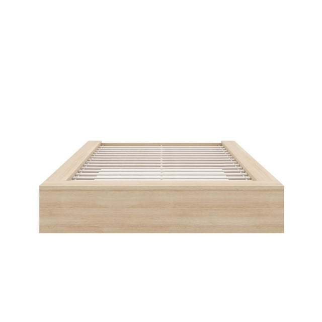 James Platform Bed in light wood finish showing wooden frame and slatted base from foot view.
