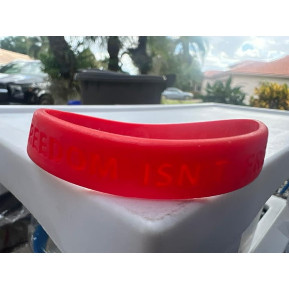 1 Freedom Isn’t Free Red Wristband Bracelet New (BONUS 1 FUN CHOPS)