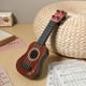 thumbnail image 3 of Juguetes de ukelele ukelele de plástico ukulele guitarra musical juguete instrumentos educativos juguete, 3 of 6