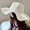 Creamy white plate, variant on Women's Wide Brim Beach Sun Hat Straw Summer Hat Wave Ribbon Sun Protection Hat