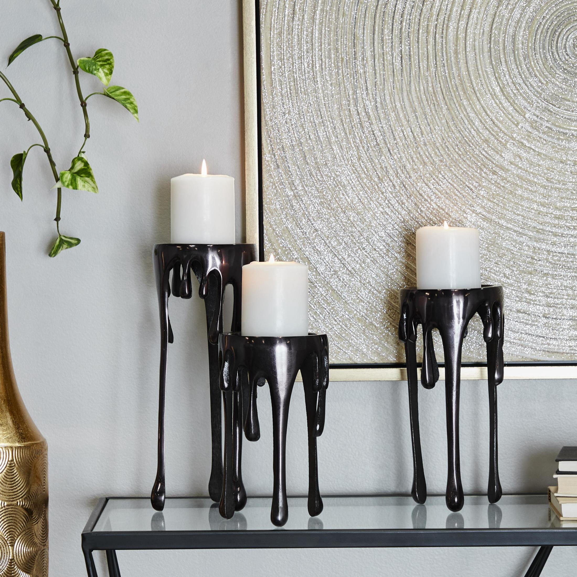 CosmoLiving by Cosmopolitan Contemporary Aluminum 3D Melting Candle Design Candle Holder, Set of 3 12" 10" 8" with Glossy Metallic Black Finish