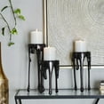 thumbnail image 3 of CosmoLiving by Cosmopolitan Contemporary Aluminum 3D Melting Candle Design Candle Holder, Set of 3 12" 10" 8" with Glossy Metallic Black Finish, 3 of 12