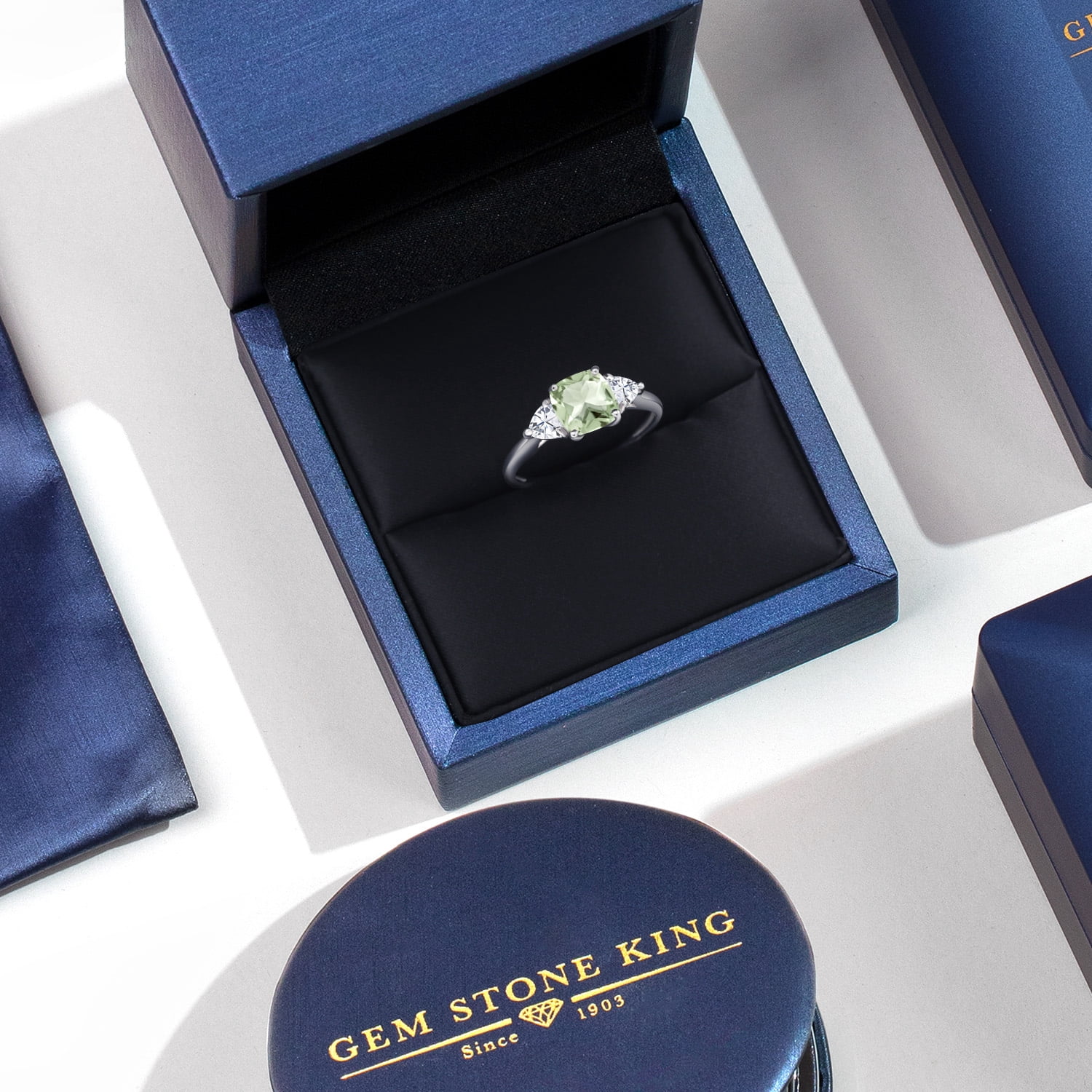 Gem Stone King 10K White Gold Green Prasiolite and White Moissanite 3-Stone Engagement Ring for Women (1.86 Cttw, 7MM Cushion and 4MM Trillion, Size 7)
