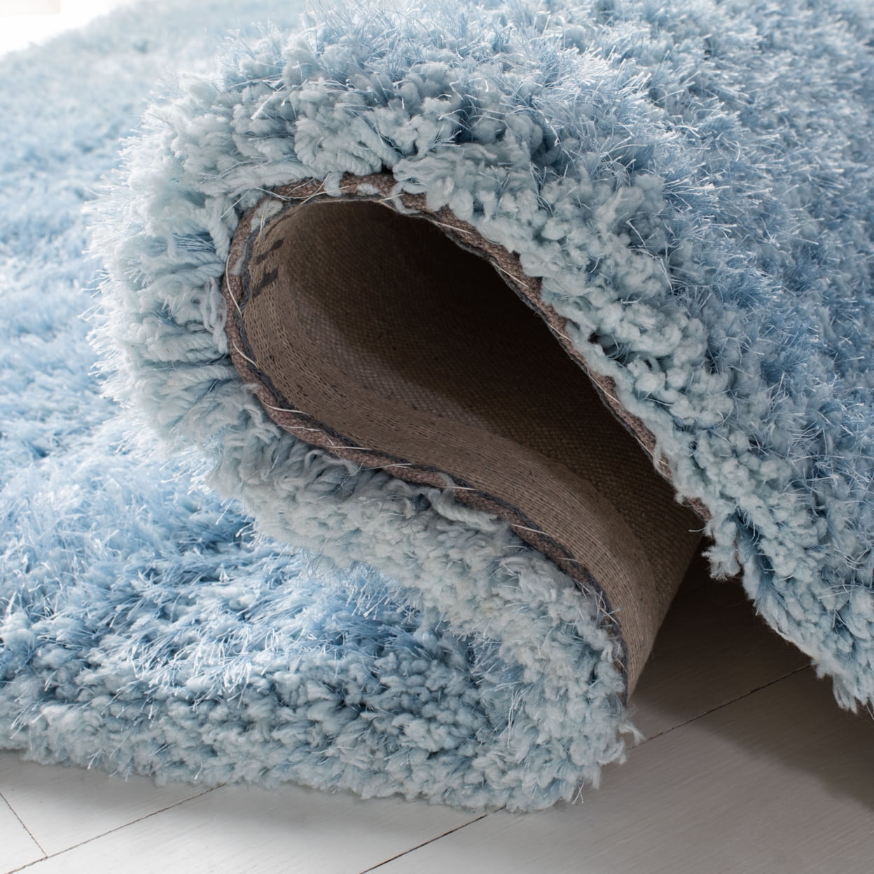 SAFAVIEH Supreme Charlton Solid Plush Polyester Shag Area Rug, Light Blue, 3' x 5'
