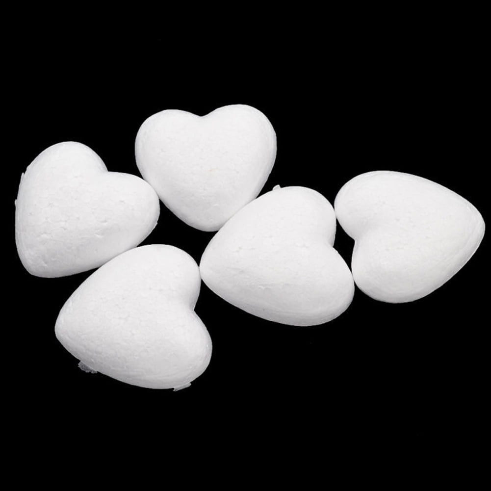 White broken styrofoam heart on a white styrofoam background close up  6401351 Stock Photo at Vecteezy