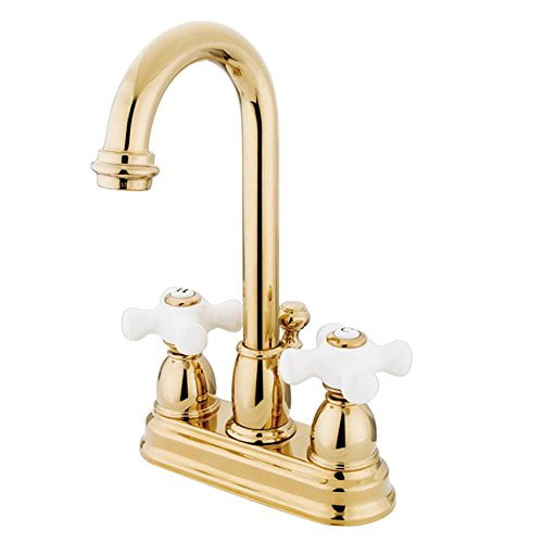 Kingston Brass Restoration Two Handle 4" Centerset Lavatory Faucet with Retail Pop-up