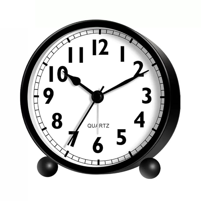 Reloj despertador redondo, silencioso, pequeño, con luz nocturna y funciona con pilas.