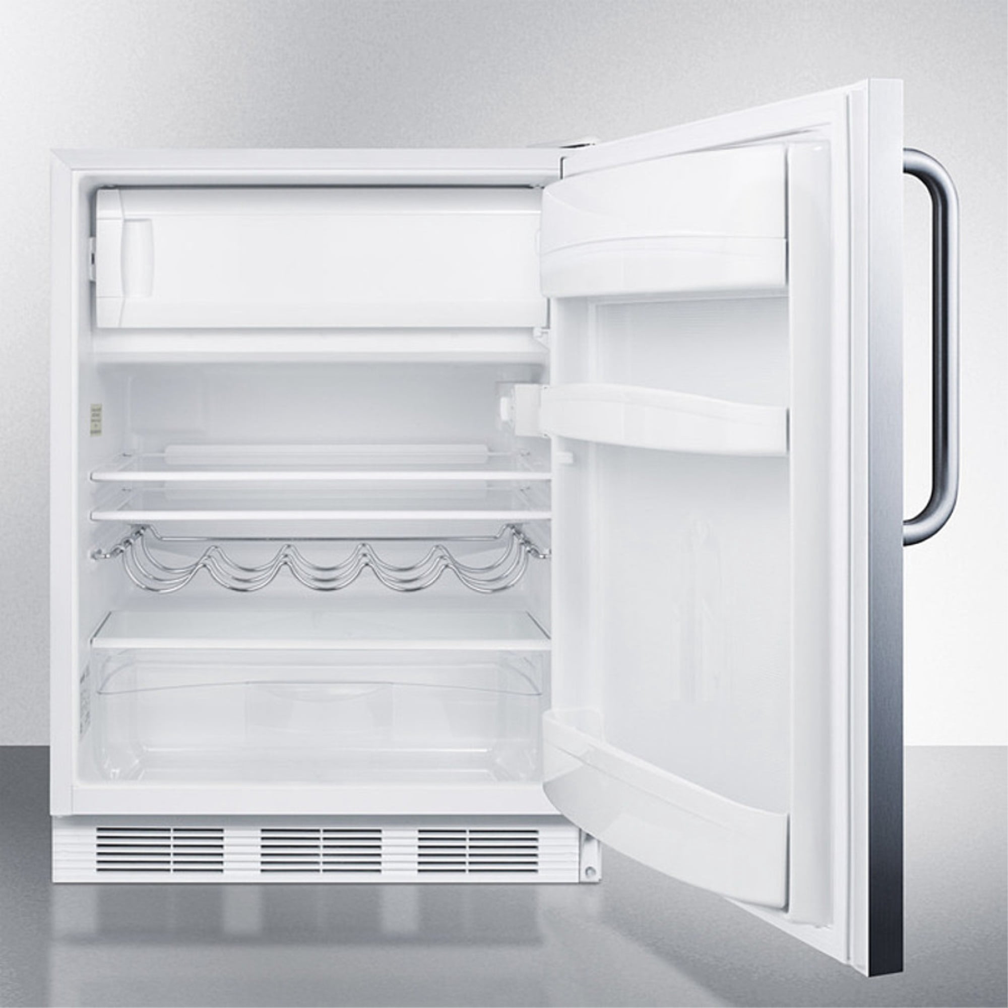 Built-in undercounter refrigerator-freezer for residential use, cycle defrost with a stainless steel wrapped door, towel bar handle, and white cabinet