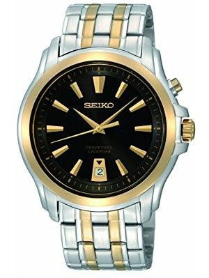Seiko Men's snq120 silver and gold analog with black dial watch -  