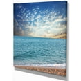 thumbnail image 2 of Fasting Moving Clouds Over Blue Beach, 2 of 3