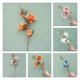thumbnail image 1 of Gwong Decoración hogareña Flor artificial encantadora táctil real tela 3 cabezas fábula magnolia flores para sala de estar Gwong 21078143, 1 of 6