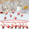 thumbnail image 1 of Mini Figuritas de Papá Noel Set de 7 - Decoraciones navideñas de resina para bolas de nieve DIY, jardines de hadas y exposiciones de la villa navideña, 1 of 3