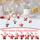 thumbnail image 1 of Mini Figuritas de Papá Noel Set de 7 - Decoraciones navideñas de resina para bolas de nieve DIY, jardines de hadas y exposiciones de la villa navideña, 1 of 3