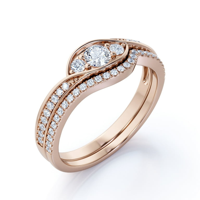 Asymmetric ring with a diamond in pink gold