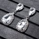 thumbnail image 3 of 1 par de pendientes plateados con forma de gota de agua, pendientes largos y brillantes con diamantes de imitación, joyería colgante, accesorios de decoración de moda para damas y niñas., 3 of 5