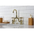 thumbnail image 3 of Kingston Brass KS7992TX French Country Bridge Bathroom Faucet with Brass Pop-up, Polished Brass, 3 of 7