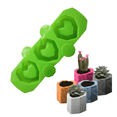thumbnail image 1 of molde de silicona para macetas y decoración de yeso cemento, resina, concreto. Plantillas de figura para maceta (Corazón Verde ), 1 of 9