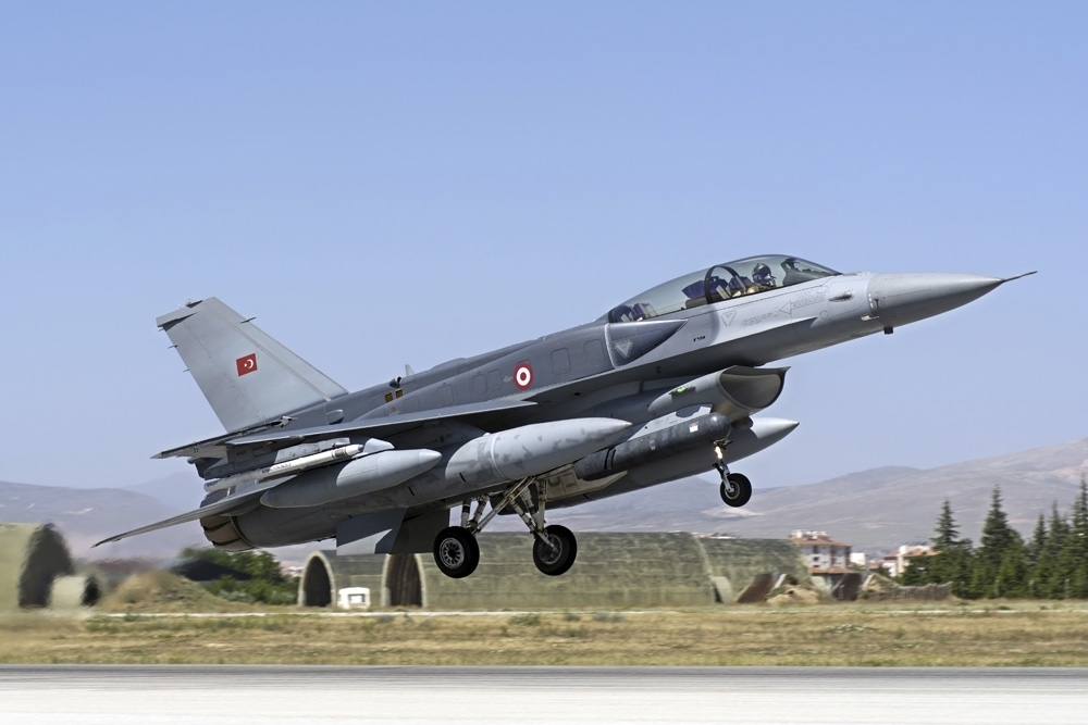 A Turkish Air Force modern F-16D Block 50+ Fighting Falcon equipped with conformal fuel tanks. These fuel tanks increase the range by 20 to - image 1 of 1