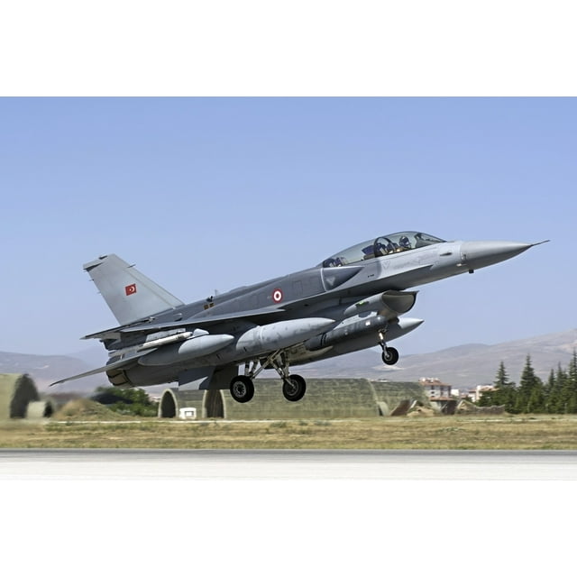 A Turkish Air Force modern F-16D Block 50+ Fighting Falcon equipped with conformal fuel tanks. These fuel tanks increase the range by 20 to