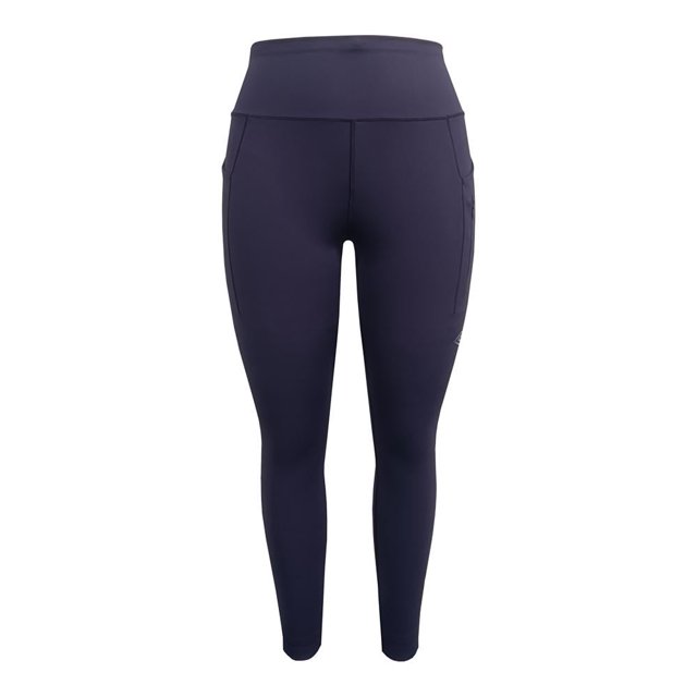 legging umbro para mujer, deportivo talla ch color morado frente sobre fondo blanco. Legging deportivo morado de corte clásico con cintura alta y ajuste en la cintura, piernas ceñidas y bolsillos laterales visibles; tela lisa y suave al tacto y logo Umbro pequeño en la pierna. Adecuado para entrenamiento y actividades al aire libre como senderismo.