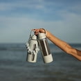 thumbnail image 5 of Mary Lawless Lee x TAL 32oz Stainless Steel 2-in-1 Straw and Chug Water Bottle with Push Lid, Chrome with Blue Ribbed Boot, 5 of 8