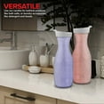 thumbnail image 3 of Plastic Juice Carafe with Lids (Set of 2) 32 oz Carafes for Mimosa Bar, Drink Pitcher with Lid, Water Bottle, Milk Container, Clear Beverage Containers for Fridge, Pantry Storage, Round Pitchers, 3 of 7