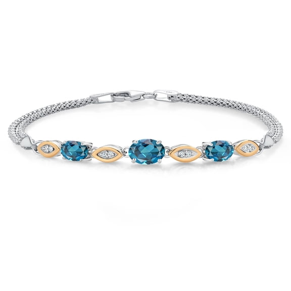 Gem Stone King 925 Silver and 10K Yellow Gold London Blue Topaz and White Lab Grown Diamond Bracelet for Women (2.26 Cttw, Gemstone November Birthstone, Oval, Wheat Chain, 7 inches)