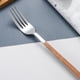 thumbnail image 4 of Juego de 4 cubiertos de acero inoxidable, vajilla portátil con mango de madera de imitación, tenedor, cuchara, cortador de carne y cubiertos para frutas (tenedor)., 4 of 7