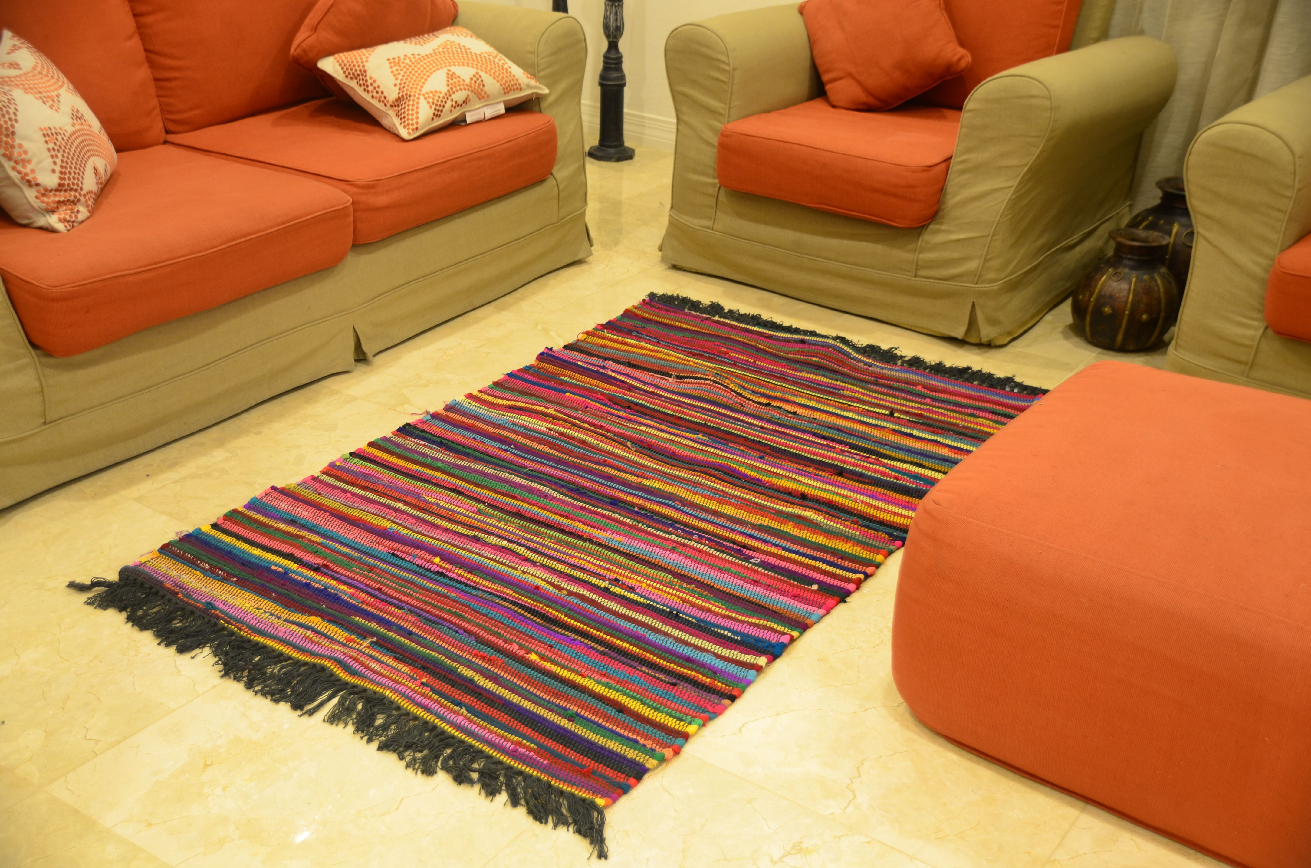 Charcoal Colored Rug In Man Living Room