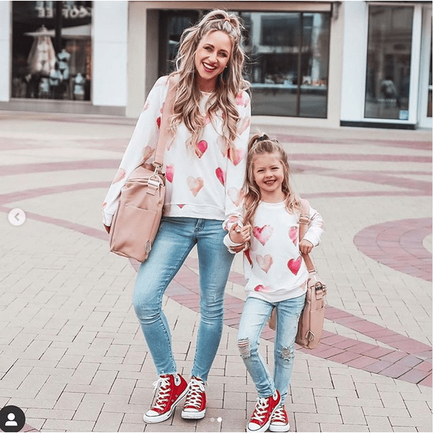 Matching clothes store daughter mother