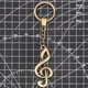 thumbnail image 2 of Bronce Retro Símbolo De La Música Llavero Colgante Llavero Llavero Del Coche Llavero Monedero, 2 of 9