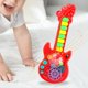 thumbnail image 3 of Mini guitarra musical interactiva, guitarra de sonido ligero, juguete musical electrónico, guitarra de juguete electrónico, para fiesta de Macarena juguetes musicales, 3 of 8