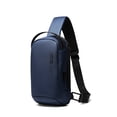 thumbnail image 1 of Mochila Cruzada Bange. Espacio para iPad, audífonos, billetera y libros. Material resistente al agua y carga USB. Modelo BG-7221 Bange BG-7221, 1 of 15