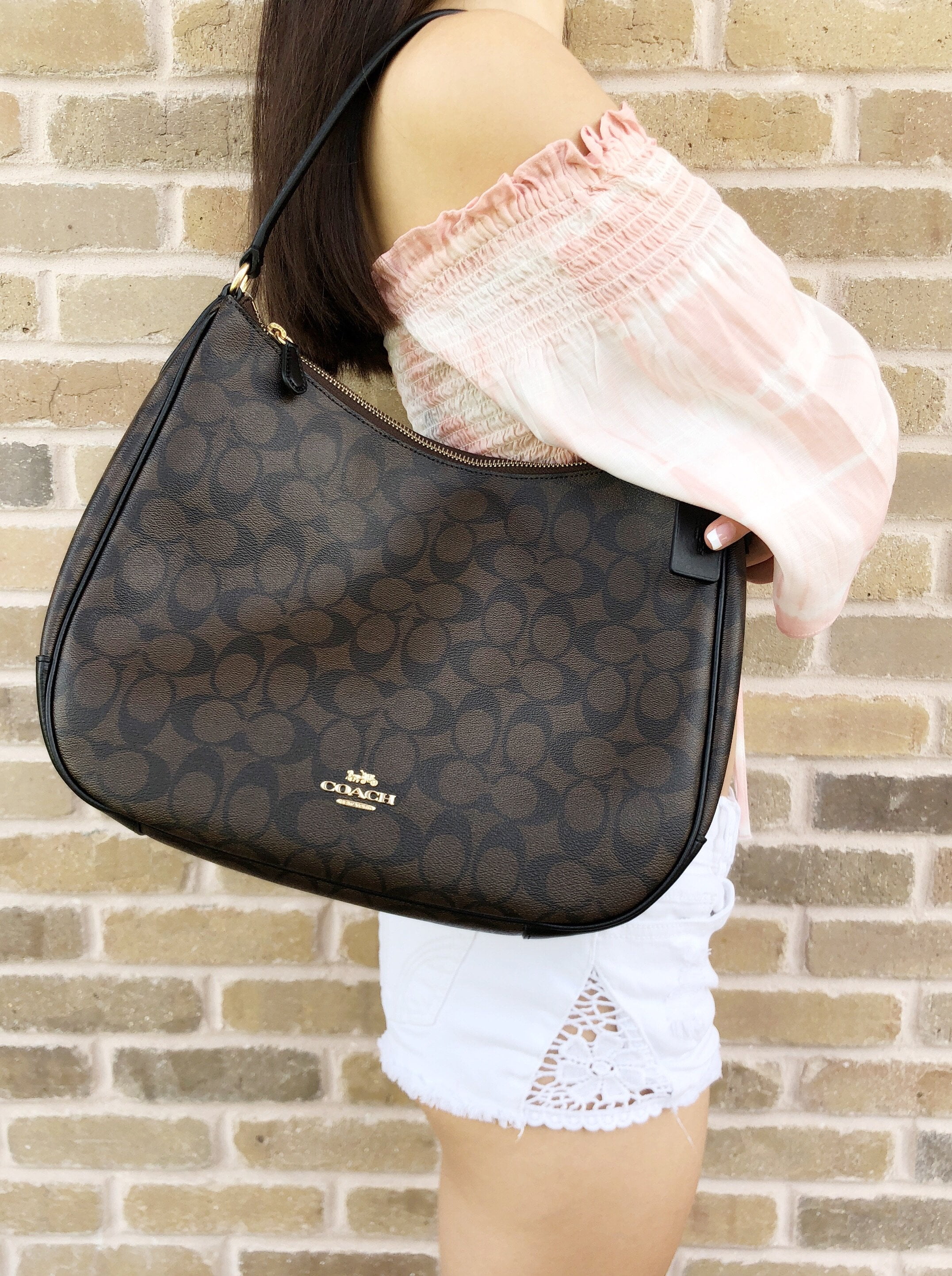 coach signature zip shoulder bag