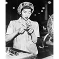 thumbnail image 2 of Wong Ruth Mae Moy Working On An American Aircraft Engine Part. She Is A Young Chinese Women Who Survived The Canton, 2 of 2