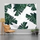 thumbnail image 1 of Tapiz de pared estilo nórdico para fotos, papel tapiz para dormitorio con diseño de hojas de plátano grandes, tela de terciopelo grueso, 150 x 130 cm, viene con una lámpara de luz de estrellas de 6 m., 1 of 3