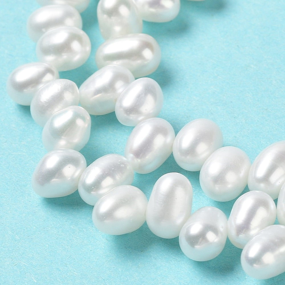 1strand Natural Cultured Freshwater Pearl Beads Strands Grade 6A+ Rice Seashell color 7~8x4~5mm Hole: 0.5mm about 70pcs/strand 13.66''(34.7cm)