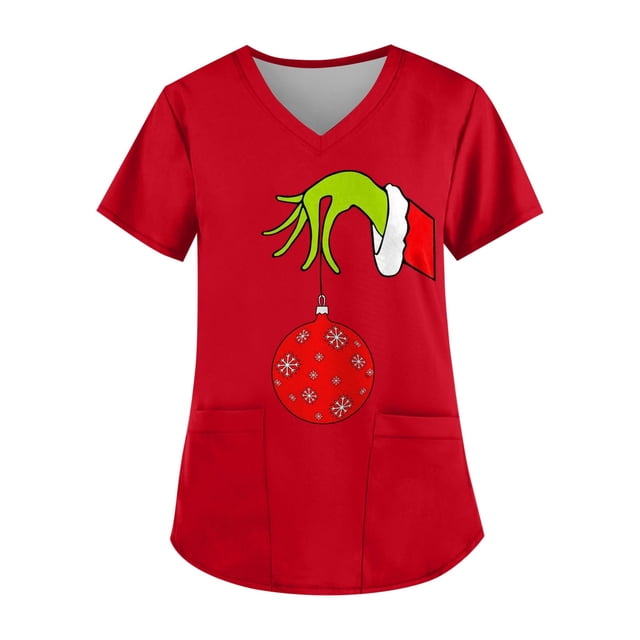 uniforme médico miarhb de talla grande con estampado navideño Rojo, camiseta de trabajo para mujer con cuello en V cruzado y 2 bolsillos; vista frontal centrada, corte holgado de manga corta y dobladillo redondeado. gráfico del Grinch en verde sujetando un adorno navideño rojo con copos de nieve; adecuada para combinar con jeans, leggings o falda.