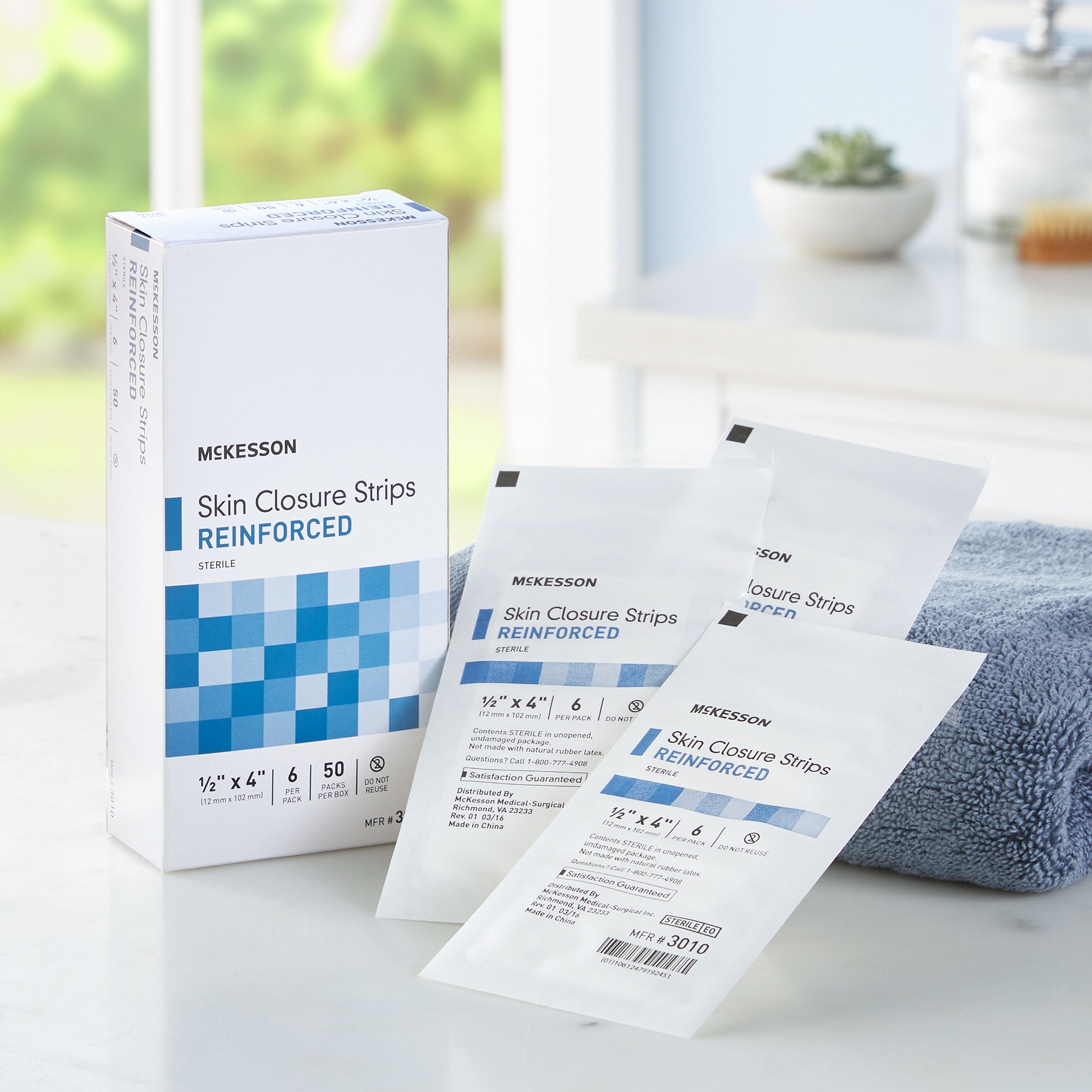 McKesson Skin Closure Strips - Sterile, Reinforced Wound Bandage, 1/2 in x 4 in, 50 Ct