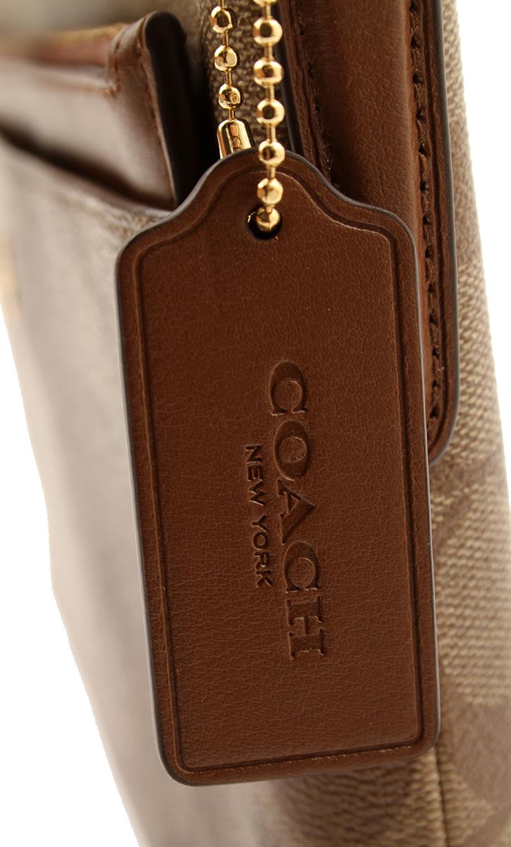 coach east west crossbody with pop up pouch