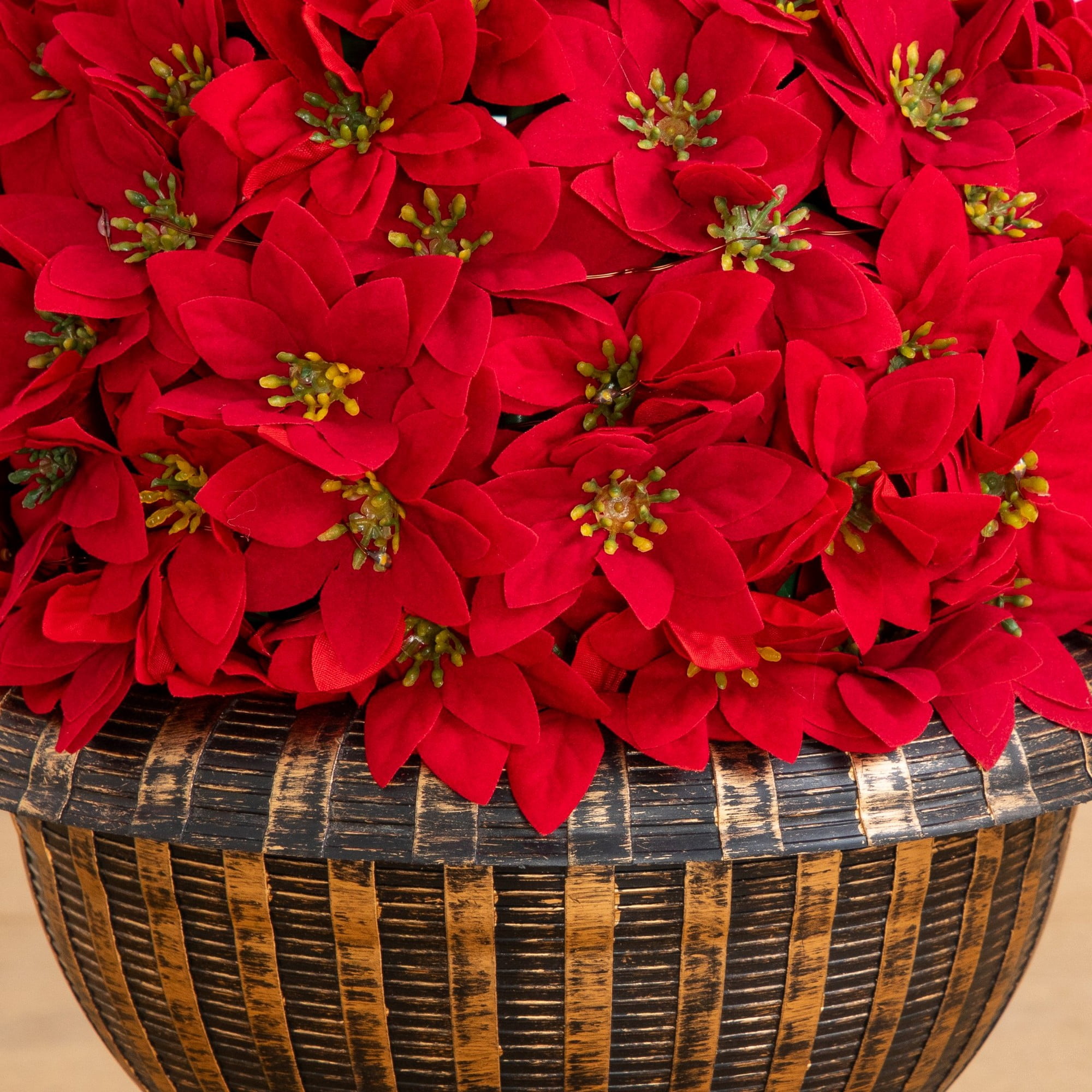 3ft. Pre-Lit Artificial Christmas Poinsettia Topiary Tree with Finial Ornament and 70 LED Lights in Decorative Urn