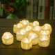 thumbnail image 5 of Velas con temporizador LED, paquete de 12 luces LED para té, velas sin llama, velas eléctricas de cera real parpadeantes, 5 of 5