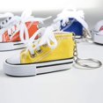 thumbnail image 3 of Llavero con colgante de zapato de lona de moda de 12 piezas, colgante de bolsa de regalo, llavero de zapatos casuales de moda, 3 of 5