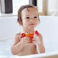 thumbnail image 4 of Hape: Rock Pool Squirters - 2pc Bath Toy Set, Orange/Red Crab & Green Suction Cup Pufferfish, Water, Bathtime, Pool, Baby, Toddler, Kids Ages 18mo+, 4 of 6