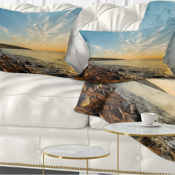 Designart Ocean Shore at Sunrise with Rocks - Modern Seascape Throw Pillow - 12x20
