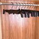 thumbnail image 5 of Paquete de 10 perchas para pantalones con pinzas antioxidantes ajustables para pantalones, faldas y perchas de ropa negras, 5 of 5